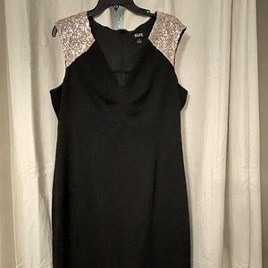 Black cocktail dress with rose gold sequined shoulders